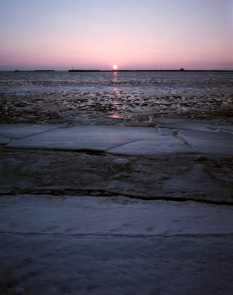 Sunset on frozen Lake Erie.